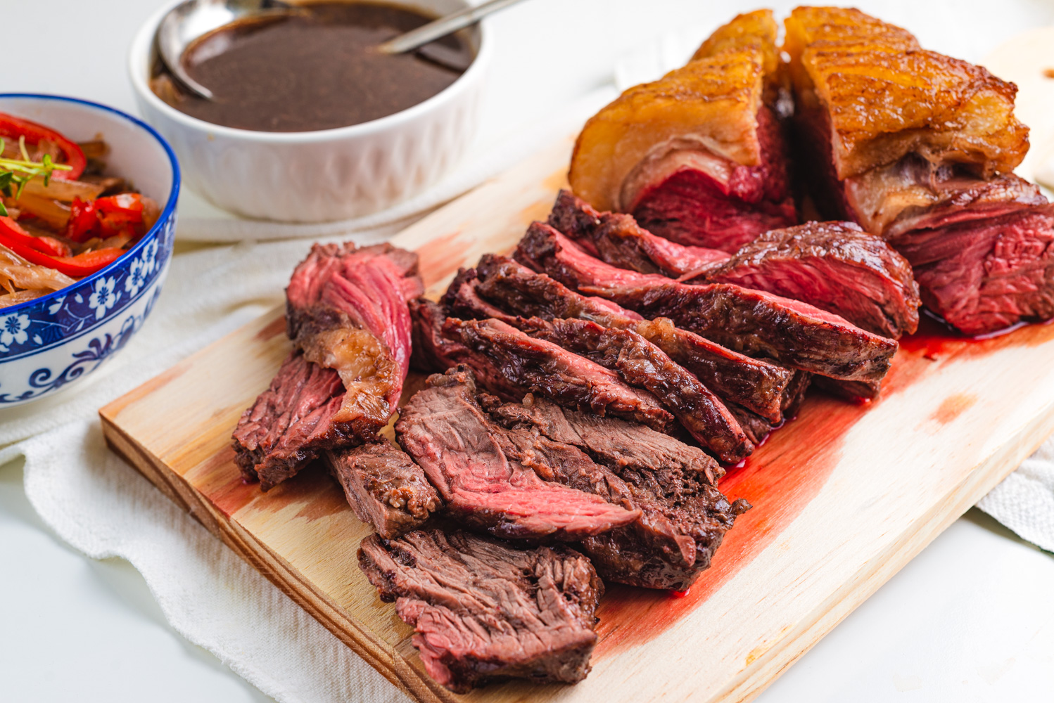 beer marinated flank steak on a chopping board
