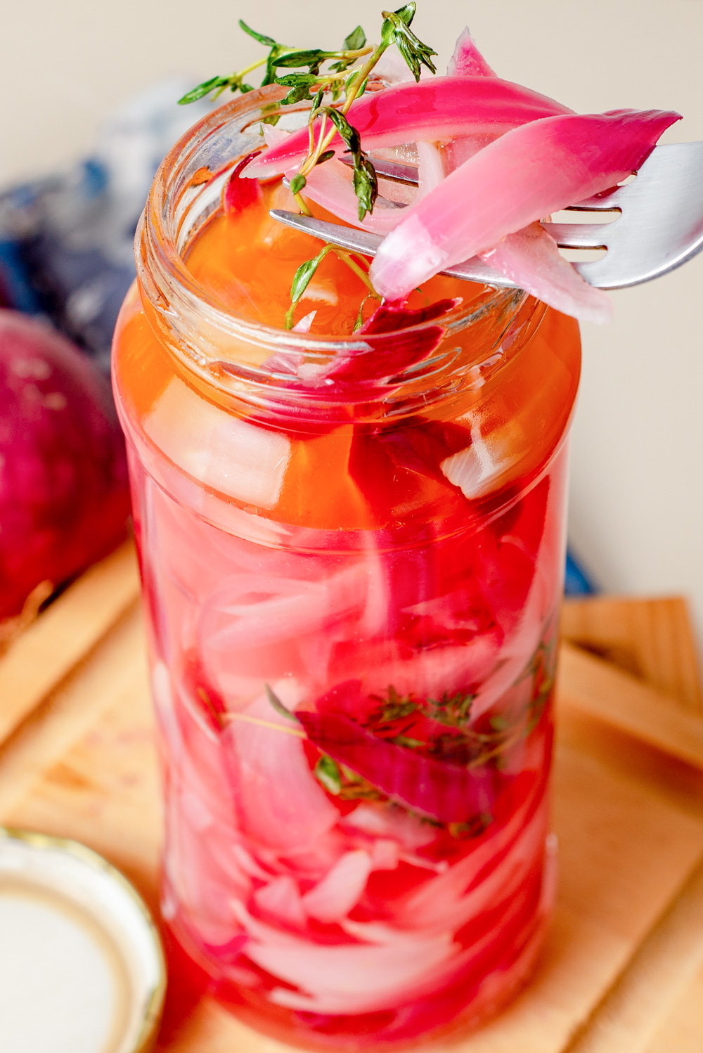 jar with italian pickled onions with thyme