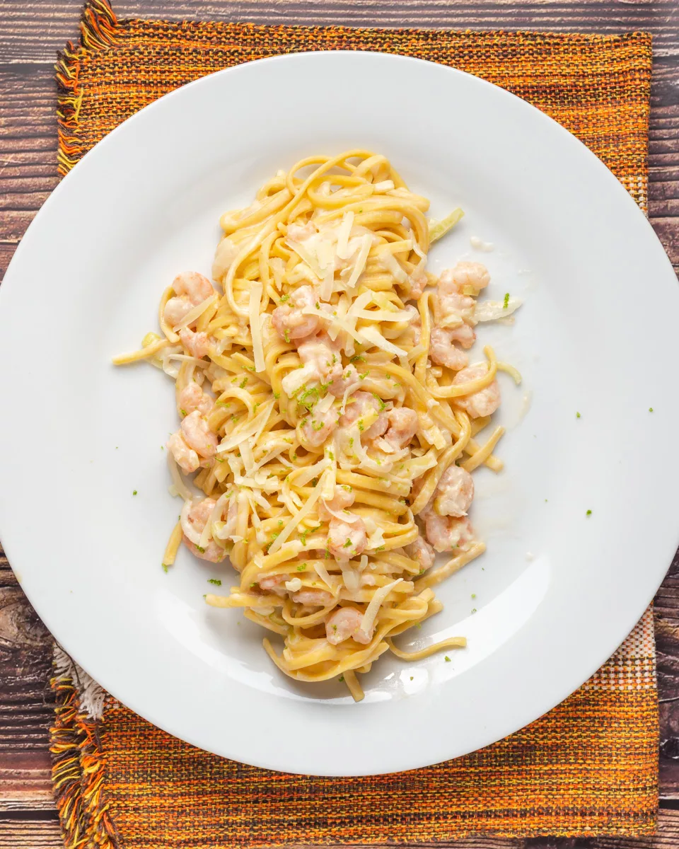 overhead photo of a plate of leeks and shrimp pasta