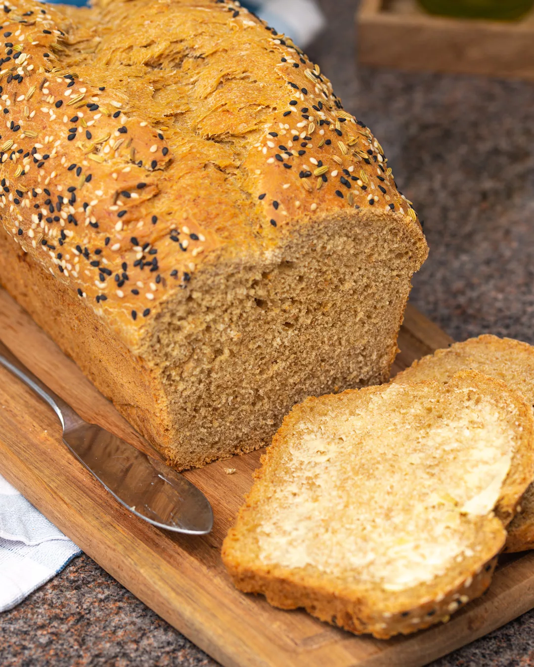 slice of an Easy seeded Wholemeal Loaf with butter