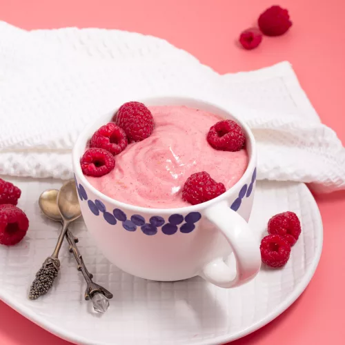 raspberry banana smoothie on a mug