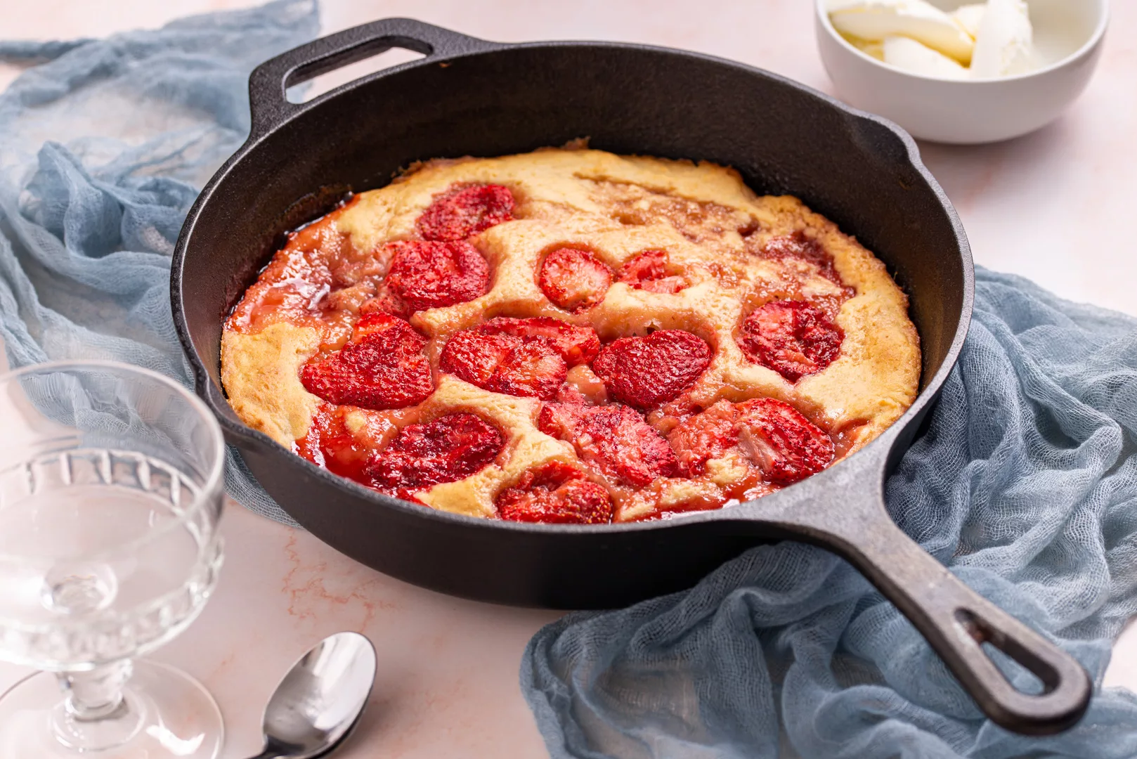 cast iron skillet with strawberry skillet cake